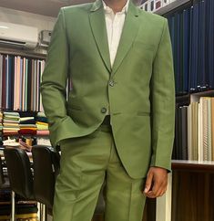 "This is a Classic Two Piece Suit by Golden Attire crafted from high quality fabric and imported materials. Our products are handcrafted by experienced tailors who make sure the that the stitching is precise, lining is proper and the overall product is sturdy enough to not go out of shape for more than a few years. Also all our products have extra margins in their length, sleeves, sides so it's easily alterable if your size changes after some time. To see more available colours and designs in this collection, Check out the 'Classic Two Piece Suits' Section. *This is a 2 piece set  and a trouser. *We also offer customization so we can provide you an even better fit if you massage us your measurements (in inches) of Chest, Stomach, Waist, Hip, Shoulder and Actual Height after ordering. *Want Green Tuxedo With Suit Collar For Wedding, Classic Green Blazer For Groom, Green Three-piece Suit For Wedding With Suit Collar, Green Notch Lapel Blazer For Wedding, Classic Green Wedding Blazer, Tailored Green Three-piece Suit For Groom, Green Notch Lapel Suit For Groom, Green Notch Lapel Three-piece Suit For Wedding, Tailored Green Wedding Blazer