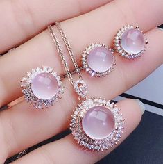 Welcome to Elegant Art Jewelry!  Stone: Natural Rose Quartz Stone Size: ( 8mm×8mm Earrings ), ( 8mmx8mm Ring ), ( 10mmx10mm Pendant ) Side Stone: Zircon Metal: 925 Sterling Silver Personalization: 9K/14K/24K/GOLD/SILVER/PLATINUM/ROSE-GOLD/WHITE GOLD. (Contact me)  Rose Quartz Pendant, Rose Quartz Cuff Pendant, 925 Sterling Silver Pendant, Oval Shape Pendant, Rose Quartz Pendant, Rose Quartz Engagement, Open Design Pendant, Rose Quartz Oval, Rose Quartz Natural, Pink Rose Quartz, Pink Rose Quartz Cheap Elegant Rose Quartz Jewelry, Exquisite Pink Jewelry With Halo Setting, Luxury Pink Cabochon Jewelry, Pink Gold Round Jewelry With Halo Setting, Pink Gold Round Jewelry With Prong Setting, Rose Gold Gemstone Jewelry For Jewelry Making, Pink Gold Jewelry With Halo Setting, Rose Gold Round Pendant Jewelry With Prong Setting, Pink Cabochon Jewelry For Anniversary