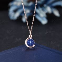 The moon engagement pendant necklace are a popular choice, represents I LOVE YOU TO THE MOON AND BACK , used to express the vastness of one's affection for another. HOW TO STYLE : it is the most versatile and elegant statement necklace for casual days in the office and nights out. It's your go-to statement piece whatever the occasion. It also can be personalized to show your uniqueness in the party, date, banquet. PERFECT FOR GIFTING: This star blue sapphire necklace is classic and never go out of style,  packaged in delicated gift box , It's a good choice of an anniversary, engagement, birthday, Mother's Day gifts, Christmas day, Thanksgiving Day, Valentine's Day gift for a couple, friend, family. AFTER-SALE SERVICE : 30 days money-back guarantee and for any reason, you are not satisfied Blue Star Necklace, Celestial Pendant Jewelry For Wedding, Blue Clavicle Chain Necklace For Wedding, Celestial Blue Birthstone Necklace, Star Shaped Sapphire Jewelry Gift, Elegant Blue Star-shaped Jewelry, Blue Round Pendant Necklace For Wedding, Blue Round Pendant Necklaces For Weddings, Blue Celestial Birthstone Jewelry