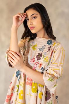 Buy Arcvsh by Pallavi Singh Beige Cotton Silk Floral Print Tunic Online | Aza Fashions Floral Print Blouse For Spring Gatherings, Spring Floral Print Blouse For Gatherings, Multicolor Blouse With Gathered Sleeves, Multicolor Tops With Gathered Sleeves For Spring, Fitted Floral Print Tunic, Spring Beige Dress With Printed Motifs, Beige Spring Dress With Printed Motifs, Spring Beige Dresses With Printed Motifs, Beige Dresses With Printed Motifs For Spring