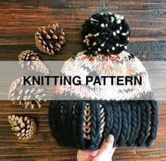 a knitted hat with pine cones on it and the words knitting pattern above it