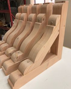 several wooden boards are stacked on top of each other and ready to be made into something