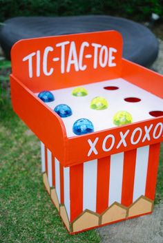 an orange and white box that says ticta - toe xoxo on it