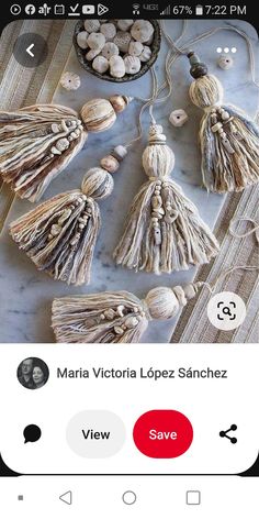 an image of some tassels and shells on a table with the caption's name below it