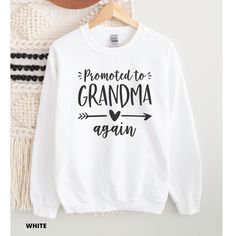 Promoted To Grandma Again, Grandma Sweatshirt, Pregnancy Reveal, Grandma Gift, Grandma Again Gift, Baby Announcement, Grandma Birthday Gift -- soft and comfortable -- standard unisex crew-neck sweatshirt -- 50% cotton, 50% polyester {SIZE AND COLOR}: The size chart and colors available are included in the photo stream. Please keep in mind that the colors may vary slightly - depending on your computer monitor settings. The size chart is based on industry-standard sizing. Please note that the meas Grandma Announcement Again, White Letter Print Sweater As Gift, White Long Sleeve Tops For Gender Reveal, Hello Grandma Announcement, White Sweatshirt For Mother's Day, Your Going To Be A Grandma Announcement, I'm Going To Be A Grandma Announcement, Great Grandma Sweatshirt Ideas, Grandma Announcement Shirt