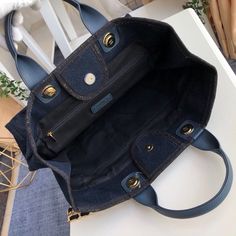 Description CC Deauville Tote Canvas Bag Dark Blue For Women 14.9in/38cm Rep 1:1 Measurements: 38 x 30 x 18 cm / 14.9 x 11.8 x 7 inches ( Length x Width x Height ) Chain Dark Blue Zipper inside Medal hardware Include dust bag. This product is of the best quality. Chanel Deauville, Dior Shirt, Gucci Shirt, Louis Vuitton Shirt, Chanel Shirt, Bag Dark, Luxury Products, Evening Clutch Bag, Chanel Bags