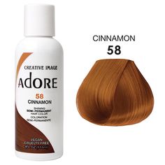 ADORE SEMI PERMANENT No Ammonia, No Peroxide, and No Alcohol. Adore’s exclusive formula offers a perfect blend of natural ingredients providing rich color, enhancing shine, and leaving hair soft and silky This product must not be used on eyebrows or eyelashes, as it may cause blindness. ABOUT THIS ITEM Vibrant Color Quick and Easy to use Made in USA Free of Alcohol, Peroxide, and Ammonia Vegan and Cruelty Free Spiced Amber Hair Color, Adore Hair Dye Black Women, Amber Hair Color, Amber Hair Colors, Hairstyle Tools, Adore Hair Dye, Blonde And Blue Hair, Amber Hair, Skunk Stripe