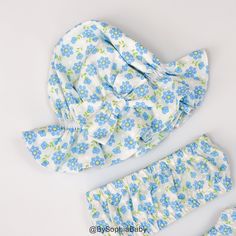 LIGHT BLUE FLORAL BLOOMER, TOP AND HAT SET - This listing is for a set of Bloomer, Top and Hat - Made of NON-STRETCHY 100% cotton fabrics that are comfortable to wear in trendy prints. Made with lots of attention to detail. - The Hat is very stretchy, it will be able to fit your baby head for a long time. - This set is perfect for Baby Sun Bath, Beach Day, Park Day, Photo shoot or Summer time! - Machine wash cold/gentle cycle, lay flat to dry & touch up with an iron. SHIPPING INFO: - FREE sh Adjustable Light Blue Sun Hat For The Beach, Adjustable Light Blue Sun Hat For Beach, Blue Summer Sun Hat For Playtime, Blue Sun Hat For Summer Playtime, Cute Blue Sun Hat For The Beach, Playful Blue Sun Hat For Playtime, Light Blue Beach Hat One Size Fits Most, Cute Blue Sun Hat For Beach, Summer Playtime Blue Sun Hat