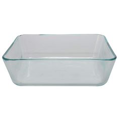 an empty glass baking dish on a white background