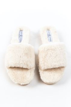 Slideeeee into coziness with the Rally Fluffy Slides! Add softness to every step with these incredible plush house slippers. With a hard textured sole, these slides are great for grabbing the mail on those cold mornings or afternoon walks around the block! *FINAL SALE* Soft Comfortable Winter Slippers, Super Soft Slip-on Comfy Slippers, Comfy Slip-on Super Soft Slippers, Super Soft Comfortable Winter Slippers, Comfy Indoor Winter Slippers, Comfortable Super Soft Winter Slippers, Comfortable Soft Slip-on Slippers, Comfortable Winter Slippers For Loungewear, Comfortable Winter Loungewear Slippers