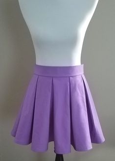 "-Box Pleat Mini Skirt- This box pleat mini skirt is custom made to fit you and is available in a wide variety of colors. It is perfect for an anime school uniform cosplay or everyday wear in a fun summer skirt. It is available in any size from petite to plus size and the lengths included in this listing are from 12 to 16 inches. Length is measured from the center of the waistband (the smallest part of the waist) to the bottom hem. The skirt is made from high quality 100% cotton fabric and close Fitted Purple Skirt For Cosplay, Purple Fitted Skirt For Cosplay, Fitted Flared Purple Mini Skirt, Fitted Mini Skirt For Cosplay, Purple Pleated Skirt-style Skort, Pleated Purple Skort, Purple Pleated Mini Tennis Skirt, Cosplay Pleated Mini Skirt, Purple Fitted Mini Skirt For School