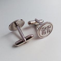 Groom Wedding Gift,Silver Men CuffLinks,Engraved Monogram CuffLinks,Gift for Fathers Day,Elegant Monogrammed CufflinksSmart and classy, silver monogram finish makes a wonderful personalized gift with his initialsPersonalize these cuffs with his initials (2-3 letters) and choose 925 sterling silver / 18k gold plated / white gold plated finish.* Please note the initials in the order you wish for them to appear. Traditionally a monogram is in this order: First, Last,Middle *Metal type: choice of 92 Luxury Modern Round Cufflinks, Monogram Cufflinks, Groom Wedding Gift, Wedding Cufflinks Groom, Monogram Necklace Gold, Monogrammed Cufflinks, Initial Cufflinks, Personalized Gold Necklace, Map Jewelry