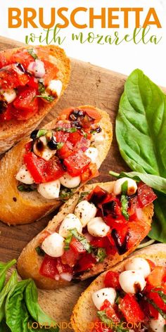 bruschetta with mozzarella and spinach leaves on a cutting board