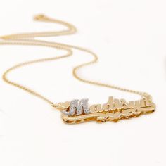 "Personalized gold and diamond 3D name necklace 1.50\" wide made of solid 14k Yellow gold and first letter in Diamonds. The necklace suspends from a Cuban Link chain with 4 choices of length: 14\",16\", 18\" and 20\". The necklace can be made with the name of your choice up to 9 letters. A Great gift for Christmas Valentines, Birthday, Anniversary or any other occasion. Contact us for pricing if your name has more than 9 letters. Please use the note section available at checkout to let us know t Luxury Gold Nameplate Necklace, Luxury Gold Name Necklace With Custom Name, White Gold Nameplate Necklace With Names, White Gold Nameplate Jewelry With Names, White Gold Nameplate Necklace, Luxury Gold Custom Name Necklace, Personalized Hallmarked Nameplate Necklace, Yellow Gold Nameplate Necklace, Yellow Gold Custom Nameplate Necklace For Anniversary