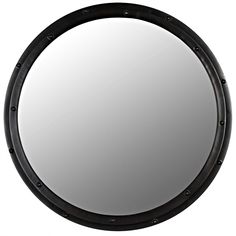 a round mirror with black trim around it