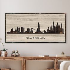 the new york city skyline is displayed on a wall