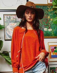 Elevate your style with our Rust Tunic Top—your new go-to piece for effortless chic! This tunic is all about the details, designed to bring a fun and fashionable flair to your wardrobe. With trendy reverse stitch details and flowy dolman sleeves, this solid tunic top offers a unique twist on a classic look. The boat neck adds a touch of sophistication, making it perfect for any occasion, whether you're dressing up for a night out or keeping it casual for a day at the park. Slip into this Rust Tu Spring Crew Neck Tunic, Solid Color Batwing Sleeve Tops For Fall, Chic Oversized Tunic For Loungewear, Fall Solid Color Batwing Sleeve Tops, Oversized Tunic For Fall Layering, Slouchy Top For Spring, Slouchy Long Sleeve Summer Tops, Casual Tunic For Fall Layering, Oversized Tunic For Layering