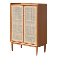 the cabinet is made out of wood and wicker