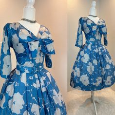 "Suzy Perrette dress / 1950s dress / 50s dress / 1950s fit and flare dress This 1950s Suzy Perette dress is made from a soft silk and has a gorgeous floral print. I love her floral print and how the fabric looks it's hard to tell if it is white flowers on blue or blue flowers on white. It is truly a magical print . She has the classic fit and flare cut with the nipped waist, a full skirt, and her original wide belt. She has a metal zipper in the back. Measurements provided are flat and have been Vintage Fitted A-line Tea Length Dress, 1950s Style A-line Midi Dress For Formal Occasions, 1950s Style A-line Dress With Box Pleat, Vintage Silk Midi Dress For Evening, 1950s Style Knee-length Midi Dress For Party, Vintage A-line Cocktail Dress With Fitted Bodice, Party Dress With Box Pleat And Full Skirt, Vintage Silk Midi Dress For Cocktail, Vintage Silk Midi Cocktail Dress