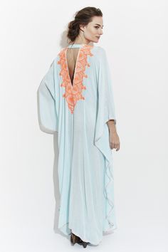 El Fenn is an authentic Moroccan kaftan. It is great to wear as a swim cover up, from morning until nighttime making a very elegant statement. This vibrant kaftan is ultra soft, made from the finest Egyptian cotton. 100% Cotton Natural Dyes One Size Dry Clean Handmade in Morocco MAISON DU CAFTAN Long Kaftan For Poolside And Beachwear, Beachwear Kaftan For The Beach, V-neck Beachwear Kaftan For Poolside, Unlined Beach Kaftan, Beachwear Unlined Kaftan For Beach, Unlined Beach Kaftan For Beachwear, Bohemian Style Unlined Kaftan, Bohemian Kaftan For Beach Cover-up, Festival Beachwear Kaftan With Kimono Sleeves