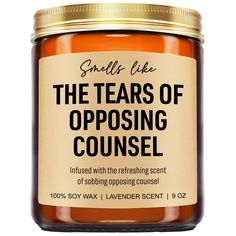 the tears of opposing coughel is in a jar with an orange label on it