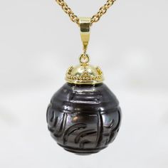 Hand-carved Tahitian Black Pearl Pendant Tahitian Pearl Pendant In Yellow Gold, Luxury Tahitian Pearl Round Pendant Necklace, Luxury Black Tahitian Pearl Necklaces, Luxury Black Tahitian Pearl Jewelry, Black Tahitian Pearl Pendant Necklace, Treasure Gold, Black Pearl Pendant, Polynesian Designs, Tahitian Black Pearls