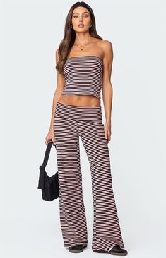 These Edkited Lilah striped fold-over wide-leg pants are the perfect choice when you want to feel comfortable while still looking put together. Rock them with their matching tube top to complete the look.PantsWide leg fitFold over waistbandStriped patternMatching setCotton, Polyester, SpandexModel wears size SModel height is 5'9Item care: Machine wash at maximum 30C, do not bleach, do not tumble dry, iron at a maximum of 110C, do not dry clean. Edikted Womens Lilah Striped Fold Over Pants size XL Fold Over Pants, Looking Put Together, Striped Pants, Put Together, Fold Over, Tumble Dryer, Pacsun, Tube Top, Leg Pants