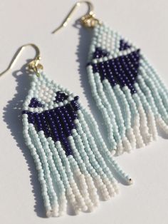 Classic beaded drape earrings with tones of ocean and sky 🌊 Fair trade Handcrafted in India Glass beads Hypoallergenic & nickel free Measures 2.75" in length Bohemian Blue Long Drop Beaded Earrings, Summer Blue Chandelier Earrings Gift, Summer Gift Blue Chandelier Earrings, Bohemian Blue Beaded Earrings With Tiny Beads, Handmade Light Blue Beaded Earrings For Beach, Light Blue Beaded Earrings For The Beach, Light Blue Beaded Earrings For Beach, Handmade Light Blue Jewelry For Summer, Blue Beaded Drop Earrings With Large Beads