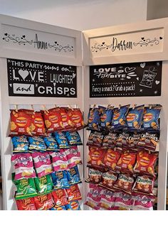 the display case is filled with chips and candy bar flavors for valentine's day