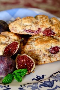 some cookies and figs are on a plate