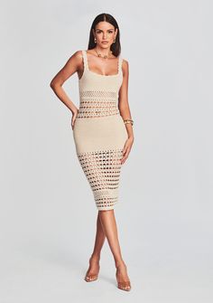 Indulge in the epitome of bohemian elegance with our Avril Crochet Dress. Crafted with meticulous detail, this mid-length stunner features intricate crocheted designs and cutout patterns that are your ticket to embodying effortless grace on any occasion. Shown here in Ivory/Gold. 85% Cotton, 10% Polyester, 5% Metallic Made in China Model is 5'11" wearing size S Style No. SS23-6476 Australia Clothes, Elegant Crochet, Summer Life, Crochet Dresses, Crochet Clothing, Crochet Summer, Crochet Skirt, Poncho Cape, Unique Crochet