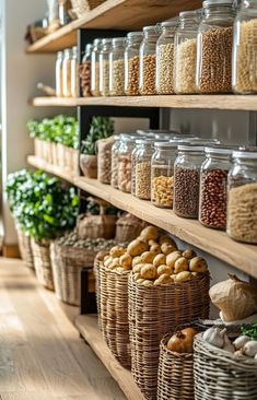 the shelves are filled with different types of foods and vegetables in glass jars on wooden shelves