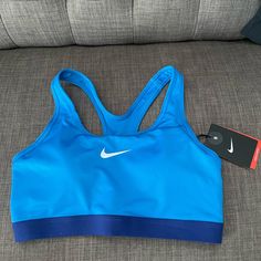 Nike Pro Classic Padded, Sports Bra, Medium Support, Size Medium. New With Tags Blue Moisture-wicking Activewear For Sports Events, Fitted Breathable Blue Sports Bra, Fitted Blue Breathable Sports Bra, Moisture-wicking Blue Activewear For Light Sports, Blue Moisture-wicking Activewear For Light Sports, Functional Blue Moisture-wicking Sports Bra, Nike Breathable Sports Bra, Functional Blue Sports Bra With Go-dry, Functional Blue Sports Bra With Go-dry Technology