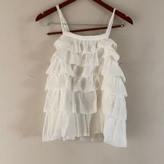 Ruffled Top Never Worn Brand New With Tags White Top With Ruffled Hem And Straps, Vacation Tops With Ruffles And Ruffled Straps, White Tops With Ruffled Straps, Summer Brunch Blouse With Ruffles, White Tops With Ruffled Straps And Details, White Tops With Ruffles And Ruffled Straps, Summer Ruffle Blouse For Brunch, Flowy Ruffled Blouse For Summer, Ruffled Straps Blouse With Ruffle Hem For Day Out