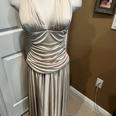 Lovely Cream Flowing Dress With Back Zip And Inside Bra Form. Cummerbund Waistline And Full Flowing Skirt. Like Marilyn Monroe’s Famous White Dress ! Never Worn Excellent Condition Party Dress With Ruched Bodice In Beige, Beige Dresses With Ruched Bodice For Party, Beige Party Dress With Ruched Bodice, Elegant Beige Halter Neck Mini Dress, Beige Halter Neck Evening Dress, Fitted Beige Maxi Dress With Ruched Details, Fitted Ruched Beige Maxi Dress, Fitted Beige Ruched Maxi Dress, Lined Summer Dress For Dinner