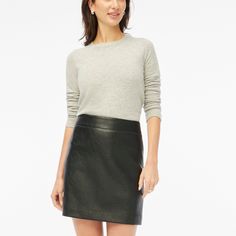 Faux-leather A-line mini skirt Trendy Flared Mini Skirt For Workwear, Fall Faux Leather Mini Skort, Fall Season Faux Leather Mini Skirt, Fitted Faux Leather Skort For Fall, Fall Faux Leather Pencil Mini Skirt, Sleek Fitted Mini Skirt For Fall, Fall Mini Skirt In Sleek Style, Spring Sleek Mini Skirt, Fall Sleek Mini Skirt