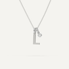 A personalized letter necklace design featuring an initial L pendant. This beautiful women's letter necklace is approx. 1cm tall and comes in solid 14k white or yellow gold with an optional 0.05 carat (3mm) diamond and an adjustable 16 inch - 18 inch chain. Minimalist Silver Diamond Initial Necklace, White Gold Initial Necklace With Diamond For Anniversary, Classic White Gold Monogram Initial Necklace, Anniversary White Gold Initial Necklace With Single Diamond, Minimalist White Gold Initial Necklace, Monogram Initial Pendant Name Necklace In White Gold, Minimalist Initial Pendant Name Necklace In White Gold, White Gold Monogram Initial Pendant Name Necklace, White Gold Monogram Name Necklace With Initial Pendant