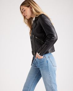 Biker chic incoming. Crafted from 100% top grain leather in a totally timeless design. This leather motorcycle jacket is unbelievably soft, and super stylish. Epaulette shoulders and robust zip details on the sleeves and pockets give it an edgy feel. Plus the pockets are spacious and usable. Fully lined with a poly satin in a slim cut, with belted hem. Read more about what makes our leather special in our Leather 101 guide.  | Quince | Women's Motorcycle Jacket in Black, Size Large, Leather Spring Classic Biker Jacket With Double-needle Sleeve, Edgy Leather Biker Jacket With Asymmetrical Zip, Chic Leather Outerwear For Biker Events, Trendy Leather Biker Jacket With Zipper, Classic Leather Jacket With Asymmetrical Zip, Biker Leather Jacket With Asymmetrical Zip For Work, Trendy Leather Jacket With Zip Fly, Moto Leather Jacket With Zipper Closure For Work, Edgy Leather Jacket With Zip Fly