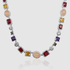 Length: 50cm (19.5")Stone Size: 5-10mm Included: Exclusive Gemstones Box ✓ 316L Stainless Steel & Rhodium✓ AAA Grade Cubic Zirconia✓ Handset / Handmade✓ Water, Heat, Sweat Resistant✓ Hypoallergenic (No Green Skin) The Gemstone Necklace showcases hues of ruby, amethyst, amber, and emerald, each handset within a beze White Gold Necklaces With Cubic Zirconia Stones, Silver Cubic Zirconia Necklace With Stones, Dazzling Cubic Zirconia Necklaces With Gemstone Accents, Dazzling Cubic Zirconia Necklace With Gemstone Accents, Dazzling Cubic Zirconia Stone Necklaces, Cubic Zirconia Stone Necklace, Round Cubic Zirconia Necklace With Stones, Silver Diamond Tennis Necklace With Gemstones, Silver Multi-stone Crystal Jewelry