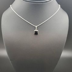 Visit our on-line shop at:Etsy.com/shop/925ForHer•sterling silver necklace pendant•square pendant with silver box chain necklace 18"•southwestern jewelry •black onyx / black stone•minimalist •calibrated pre-cut stones: 8mm square shape•all jewelry items are made to ship, slight variations in stones will occur comparing to pictures•size of a penny is 19mm or a dime is 18mm dime for comparing size with jewelry item•handcrafted in Albuquerque, New Mexico, USA•free convenient gift box•free shipping Formal Sterling Silver Necklace With Square Pendant, Square Sterling Silver Jewelry With Polished Finish, Elegant Silver Rectangular Charm Necklace, Elegant Sterling Silver Square Pendant Charm Necklace, Sterling Silver Square Jewelry For Formal Occasions, Black Sterling Silver Box Chain Jewelry, Black Sterling Silver Jewelry With Box Chain, Square Silver Sterling Silver Necklace, Square Sterling Silver Necklace In Silver