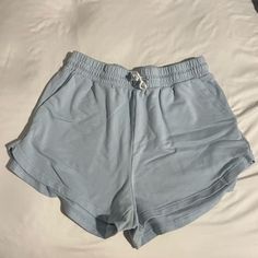 Light Blue Sleep Shorts. Never Worn. Size Medium Comfortable Blue Summer Shorts, Comfortable Blue Shorts For Summer, Comfortable Blue Beach Shorts, Casual Blue Shorts With Elastic Waistband, Comfortable Blue Summer Bottoms, Comfortable Blue Bottoms With Elastic Waistband, Comfortable Blue Relaxed Fit Shorts, Light Blue Stretch Casual Bottoms, Casual Light Blue Stretch Bottoms