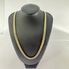 "Cubano  14k Gold Jewelry Chain Necklace - 14k Solid Yellow Gold - MD91 Defining Cuban Chains A kind of necklace known as a \"Cuban chain\" or \"Cuban link chain\" is distinguished by its substantial, interlocking oval links. The links are closely set, creating a continuous, sleek chain with a rope-like pattern. Cuban chains are often used as a statement item because of their striking look. Condition: Good pre-owned. Shows signs of wear on the band as pictured (these are very close-up photos). M 14k Gold Silver Necklace With Curb Chain, Yellow Gold Chain Link Necklace For Anniversary, Anniversary Necklace With Figaro Chain Link, Anniversary Yellow Gold Chain Link Necklace, 14k Yellow Gold Cuban Link Necklace, 14k Yellow Gold Cuban Link Necklace With Oval Links, 14k Gold Curb Chain Necklace, 14k Gold Necklace With Curb Chain Style Fine Jewelry, Gold Round Chain Necklace Stamped 14k