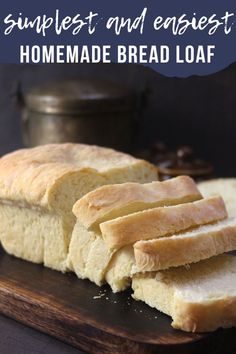 sliced loaf of homemade bread sitting on top of a cutting board with the words, simpleest and easyest homemade bread loaf