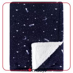 a blanket with stars on it and a white triangle at the bottom, in front of a dark blue background