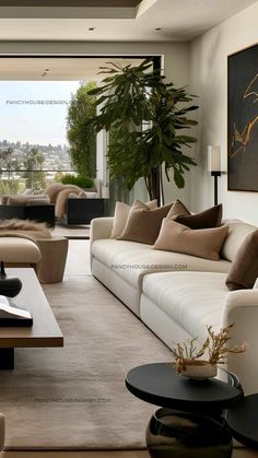 a living room filled with lots of white furniture