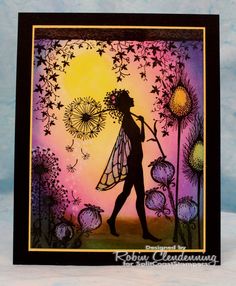 a card with a silhouette of a woman holding a dandelion