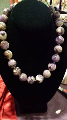 "Large beaded, penny size, amythyst necklace. Smooth polished stones, with lots of color variations. Necklace is 18\" long. This wonderful piece looks great with any outfit." Handmade Round Amethyst Beaded Necklaces, Purple Faceted Bead Necklaces, Purple Faceted Round Bead Necklaces, Purple Faceted Beads Round Beaded Necklace, Purple Beaded Necklace With Faceted Beads, Purple Round Beaded Necklace With Faceted Beads, Purple Gemstone Beaded Necklaces, Purple Crystal Necklace With Faceted Beads, Purple Jewelry With Large Round Beads