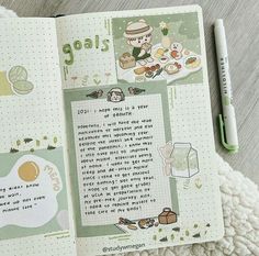 an open notebook with writing on it and a green pen next to the page that says goals