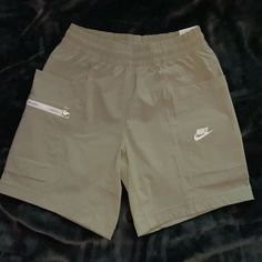 New Never Worn Above Knee Standard Fit Deep Pockets And Zipper Pocket Nike Shorts With Pockets In Solid Color, Nike Casual Shorts With Cargo Pockets, Nike Casual Beige Bottoms, Nike Casual Shorts With Pockets, Casual Nike Shorts With Pockets, Boys Nike Shorts, Nike Basketball Shorts, Camo Shorts, Nike Running Shorts