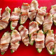 bacon wrapped jalapenos on a red tray